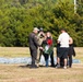 Soldier Jumps in Ceremonial Wreath