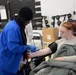 Airmen show support with blood donation