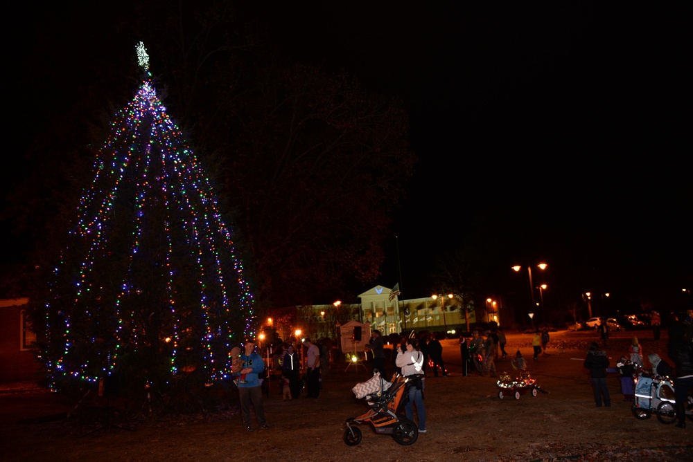Team BLAZE lights Christmas Tree