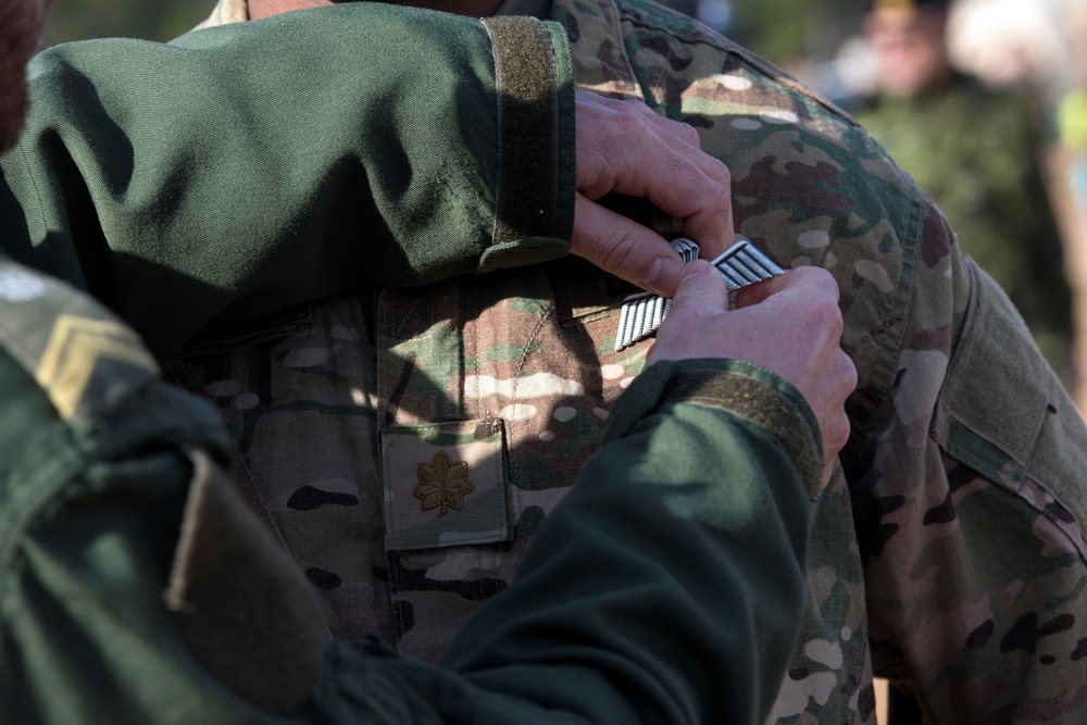 Multinational paratroopers fill NC skies