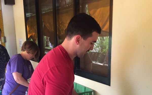 Red Lancers Chop Vegetables at Soup Kitchen in Singapore
