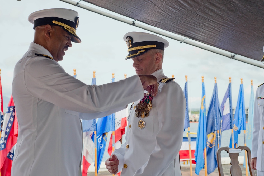 Commander, Destroyer Squadron Three One holds Change of Command