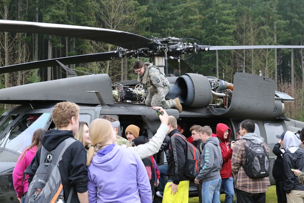 Former aviation student flies Black Hawk back to high school