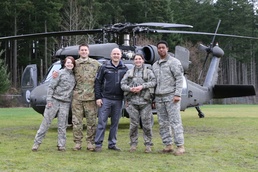Former aviation student flies Black Hawk back to high school
