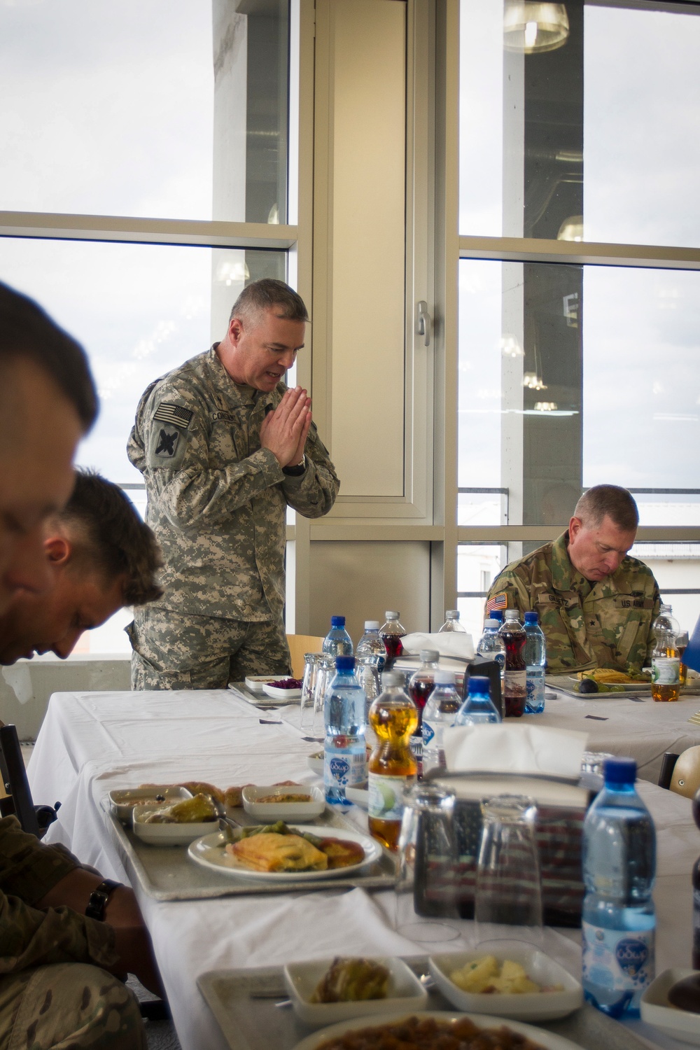 Chaplain blesses luncheon