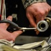 AFE Airmen inspect parachutes