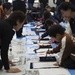 Station residents, Japanese locals brush past 2016 with calligraphy