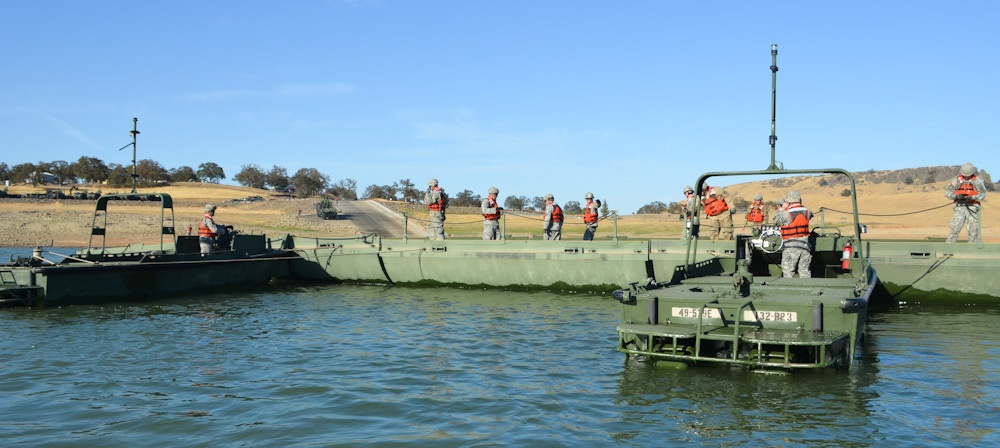 Cal Guard bridges over Black Butte Lake waters