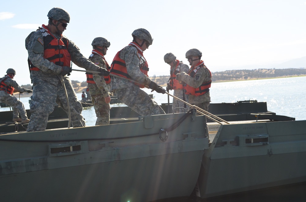 Cal Guard bridges over Black Butte Lake waters