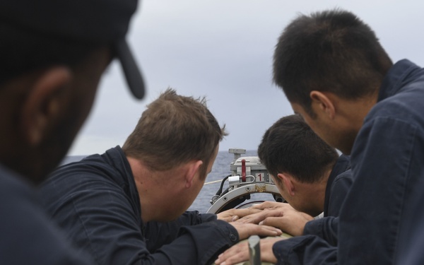 USS Wayne E. Meyer Loads Torpedos