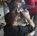 Marines experience a mochi-making ceremony in Uruma City