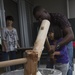 Marines experience a mochi-making ceremony in Uruma City