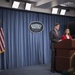 --Press secretary, acting ASD for international affairs brief reporters