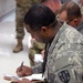 U.S. Army Reserve Soldier prepares paperwork for SRP