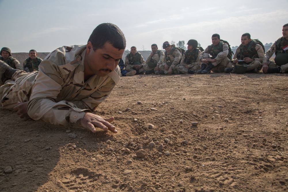 Coalition forces train ISF on improved explosive device detection