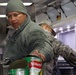 Preparing meals in a Disaster Relief Mobile Kitchen Trailer