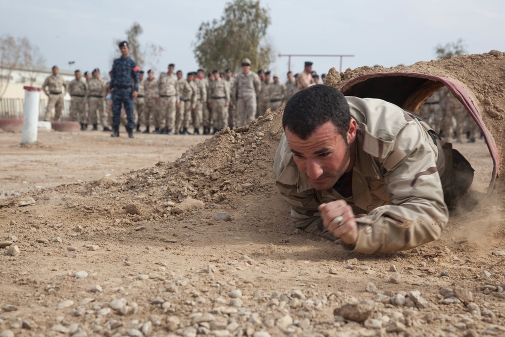 Iraqi security force practice bounding drills