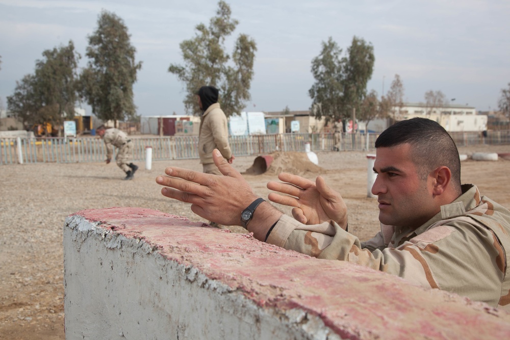 Iraqi security force practice bounding drills