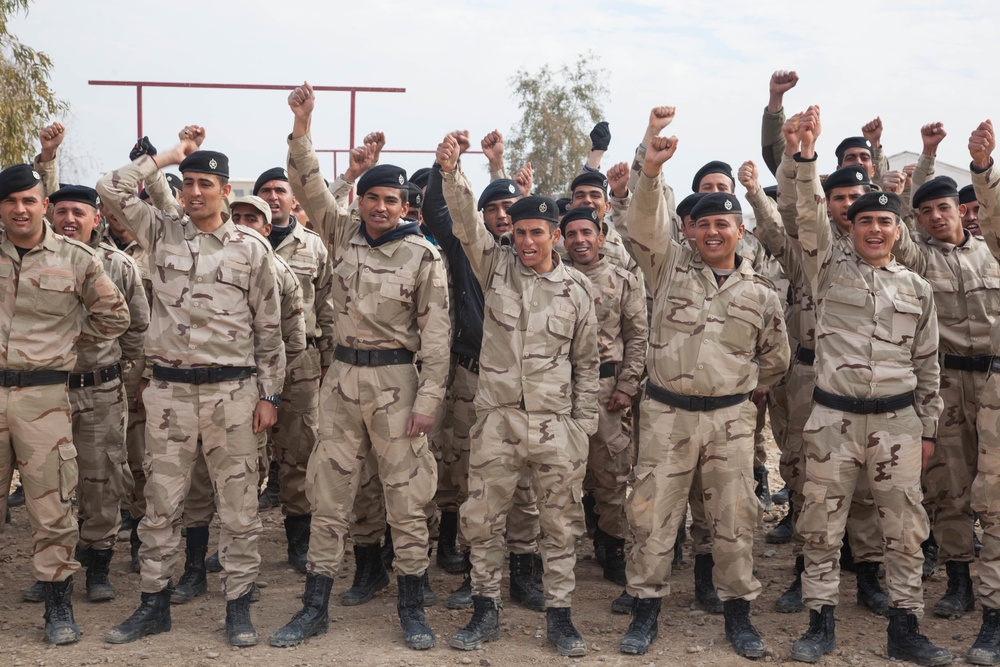 Iraqi security force practice bounding drills