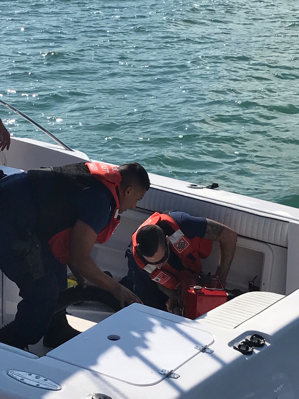 Coast Guard rescues 3 after boat takes on water