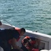 Coast Guard rescues 3 after boat takes on water