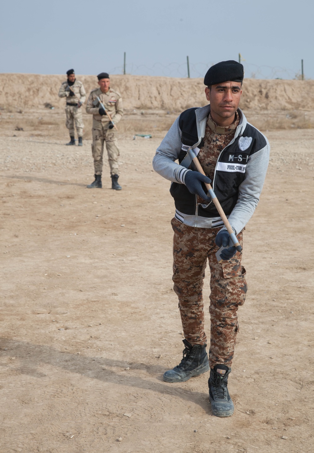 Iraqi security force practice small unit tactics