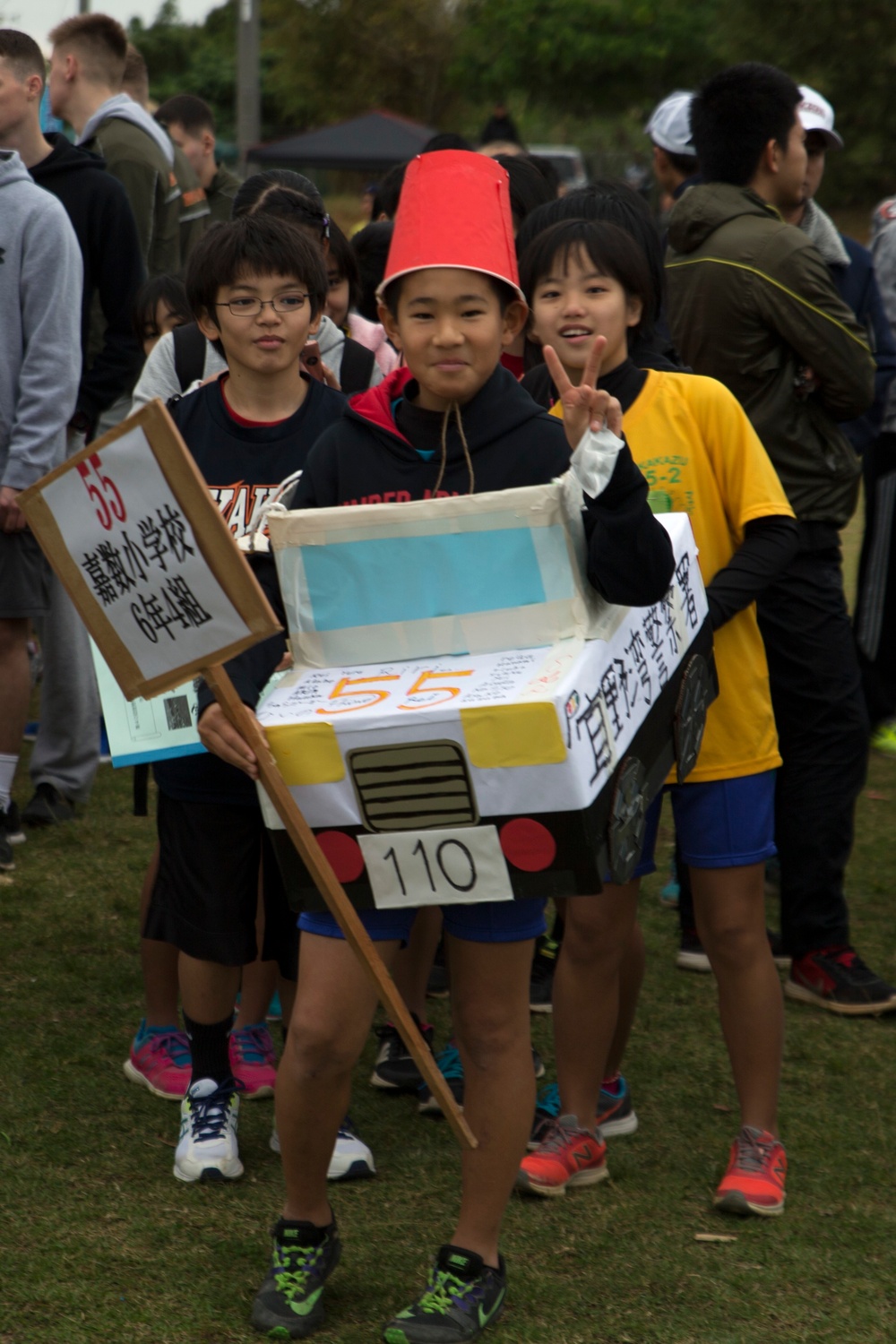 Service Members compete in Ginowan Traffic Safety Relay Race