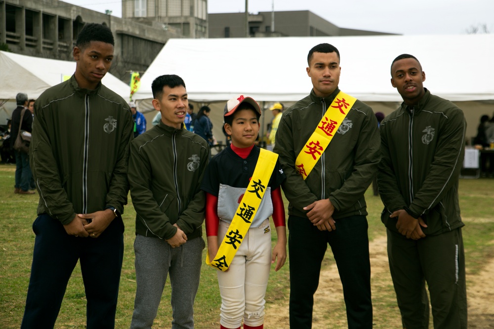 Service Members compete in Ginowan Traffic Safety Relay Race