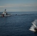 Small boats from Coast Guard Cutters Diligence, Sherman underway i