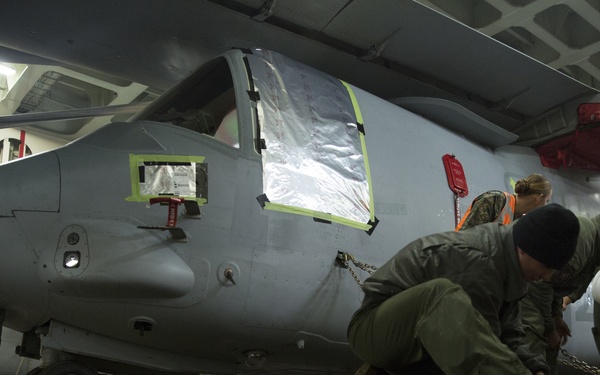 U.S. Marines load MV-22 Ospreys onto commercial ship