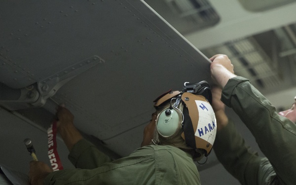 U.S. Marines load MV-22 Ospreys onto commercial ship