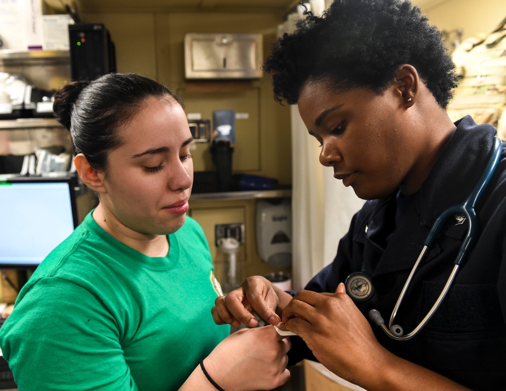 USS Wayne E. Meyer (DDG 108) Sailors give Medical Treatment