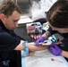 USS Wayne E. Meyer (DDG 108) Sailor Practices Phlebotomy