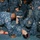 170117-N-DS065-0031 U.S. Navy personnel aboard USS Iwo Jima (LHD 7) are conducting a medical training drill or casualty care exercise. Multiple sailors in Navy Working Uniform (NWU) camouflage are practicing first aid and trauma response techniques on a simulated casualty lying on the deck. The scene depicts a realistic training scenario with simulated wounds visible on the 'casualty'.