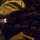 31st Marine Expeditionary Unit completes MEUEX A soldier wearing a tan/olive beret is photographed at night while aiming a rifle equipped with optical sights and tactical accessories. The image is taken in low-light conditions with bokeh city lights visible in the background. The subject appears to be in a combat-ready or patrol posture.