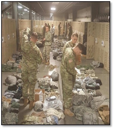 Soldiers layout gear in preparation for Korea deployment