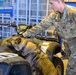 Military Working Dog and Handler Train in a Hangar