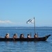 Sailors wait ashore to assist Squamish tribe with canoes