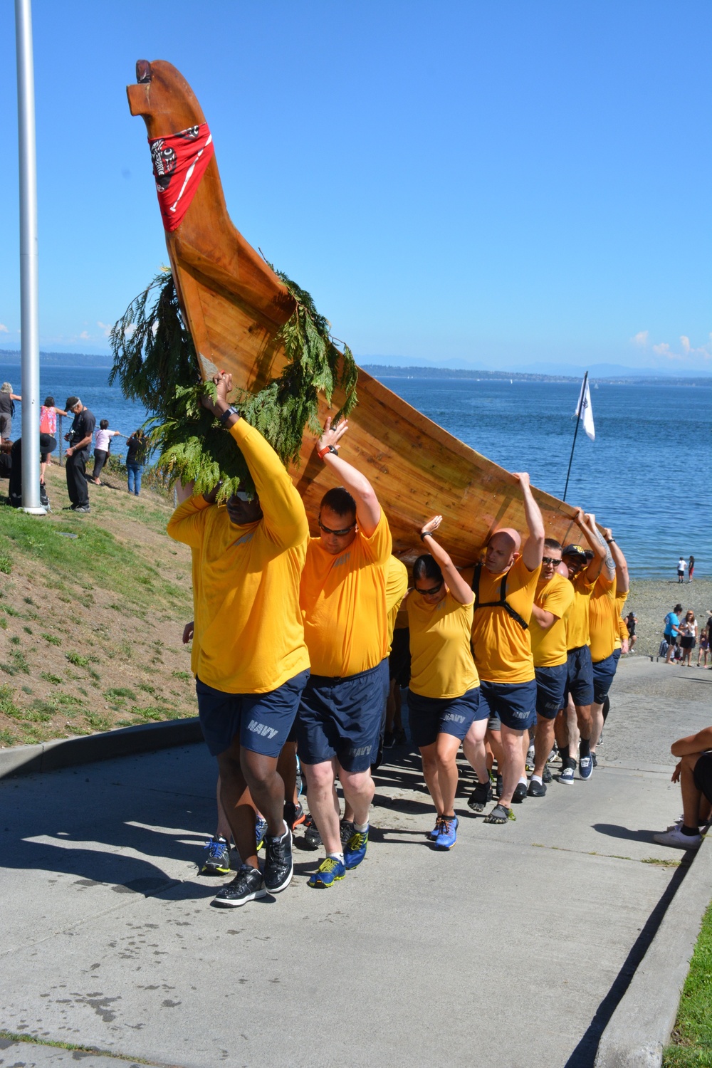 Sailors assist Squamish tribes by moving canoe out of water