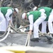 Sailors from USS Topeka Send Heaving Lines to the Pier Jan. 28
