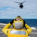 Helicopters land aboard USS Green Bay’s flight deck during patrol