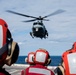 Helicopters land aboard USS Green Bay’s flight deck during patrol