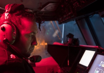 Naval Beach Unit (NBU) 7 Personnel Conduct Maintenance on Landing Craft Air Cushion (LCAC) 21 In the Well Deck of Amphibious Assault Ship USS Bonhomme Richard (LHD 6)