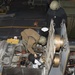 Naval Beach Unit (NBU) 7 Personnel Conduct Maintenance on Landing Craft Air Cushion (LCAC) 21 In the Well Deck of Amphibious Assault Ship USS Bonhomme Richard (LHD 6)