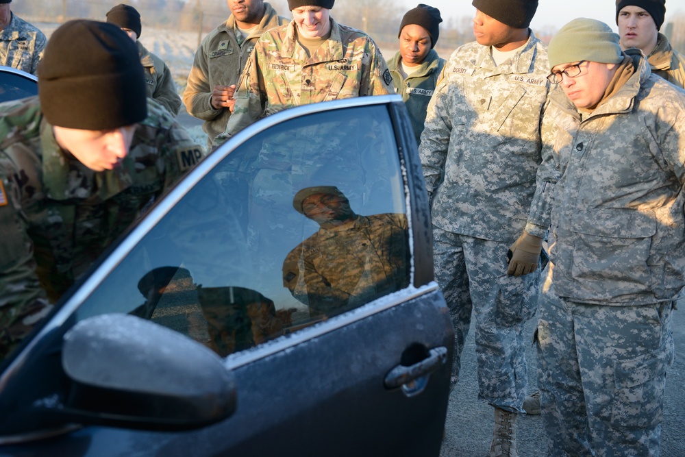 MP Teaches Signal Soldiers How to Search a Vehicle and an Individual