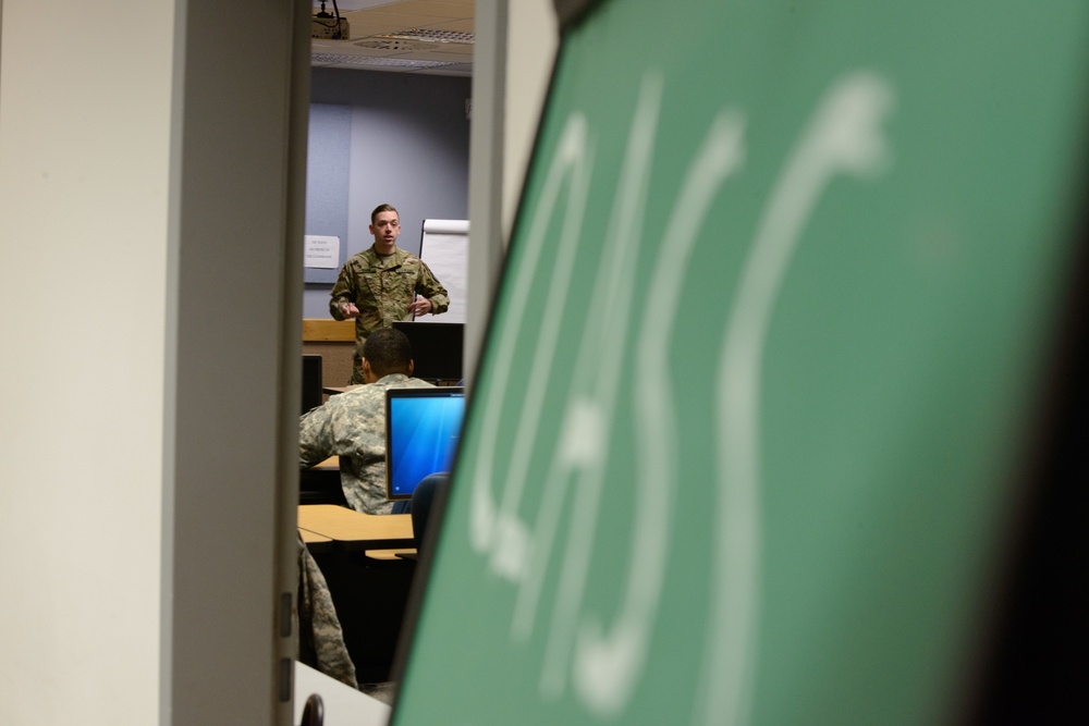 MP Teaches Signal Soldiers How to Search a Vehicle and an Individual