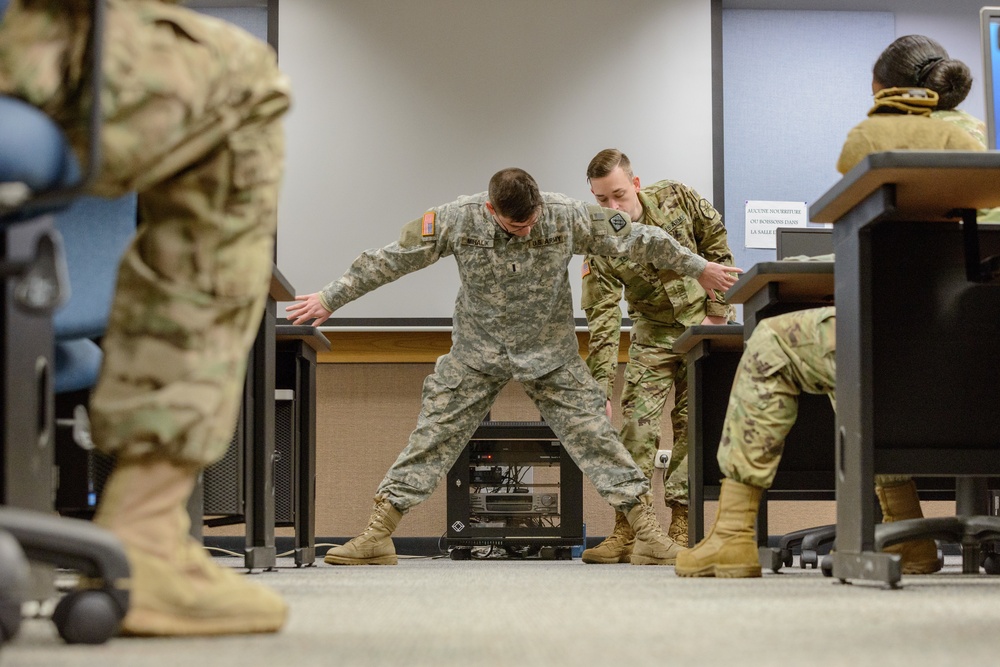 MP Teaches Signal Soldiers How to Search a Vehicle and an Individual