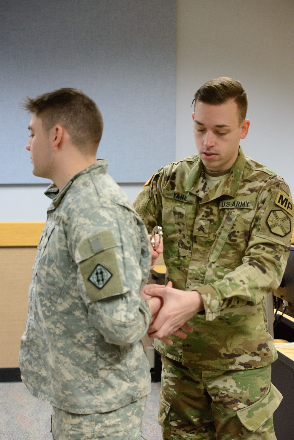 MP Teaches Signal Soldiers How to Search a Vehicle and an Individual