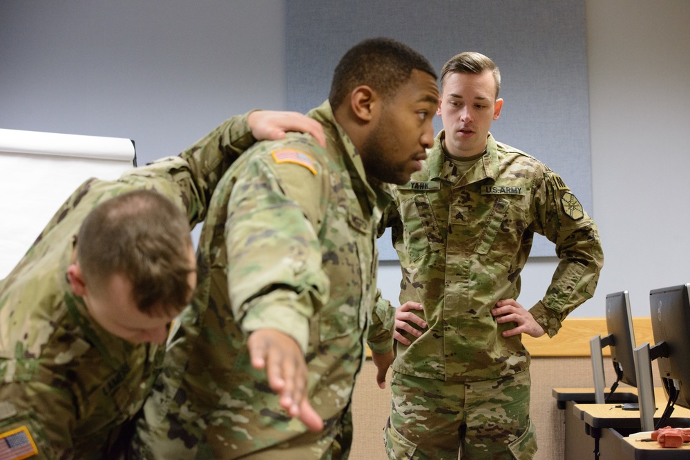 MP Teaches Signal Soldiers How to Search a Vehicle and an Individual