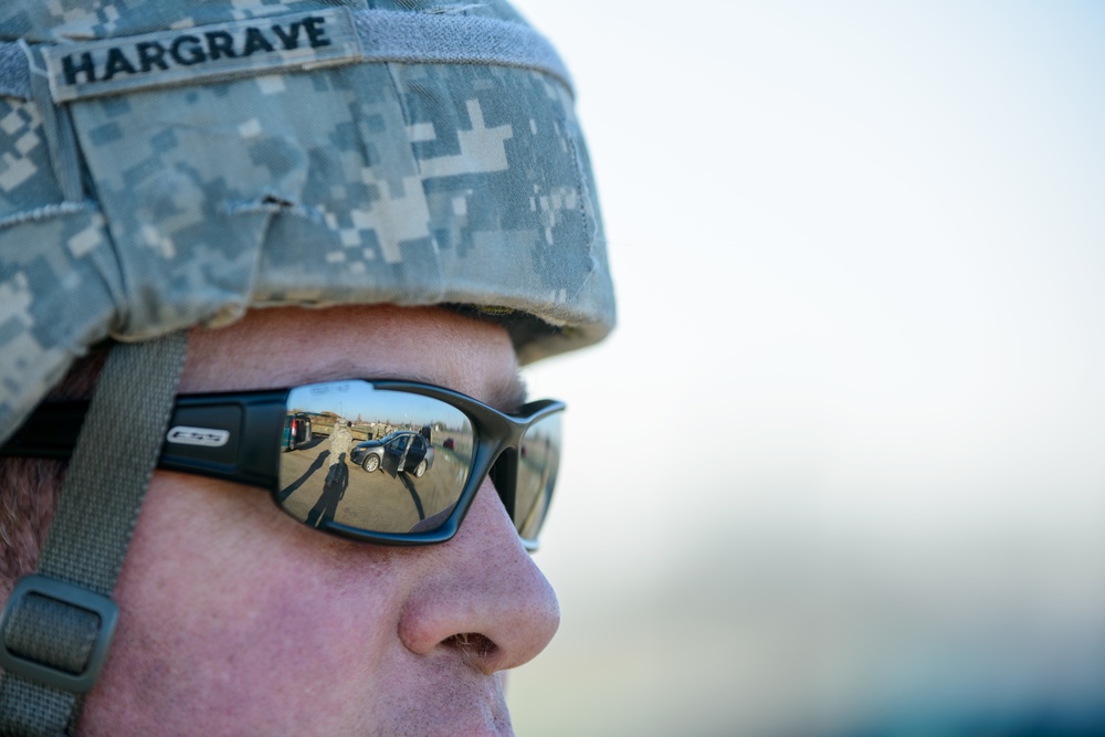 MP Teaches Signal Soldiers How to Search a Vehicle and an Individual